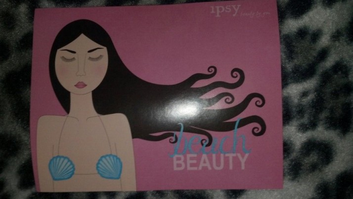 Here is the cute little card inside saying "Beach Beauty" and on the back it describes all the products that came in my bag! 